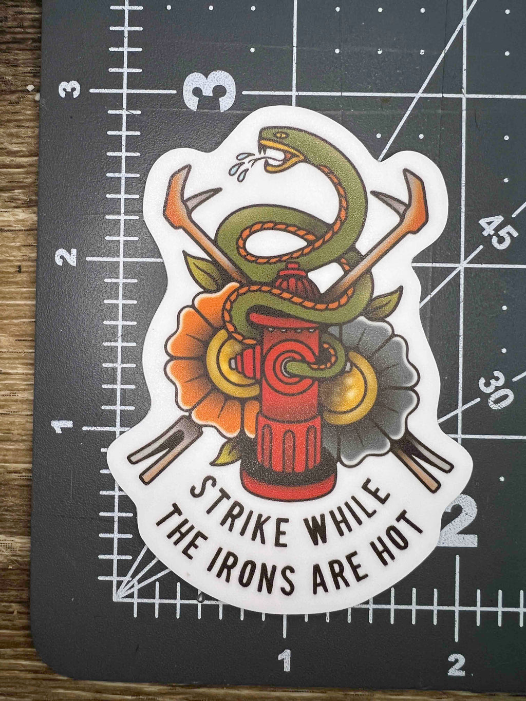 "Strike While The Iron Is Hot" Sticker