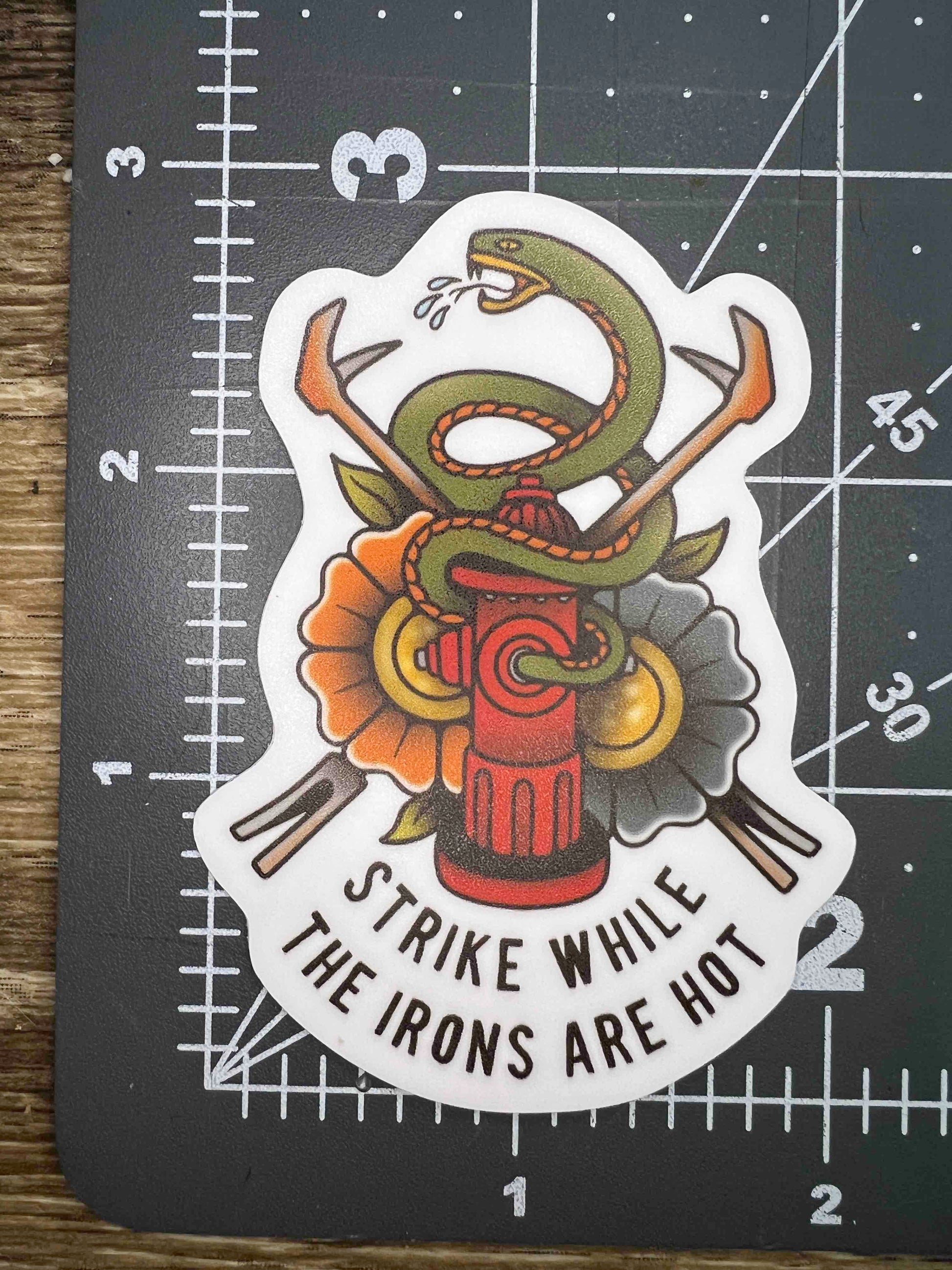 "Strike While The Iron Is Hot" Sticker