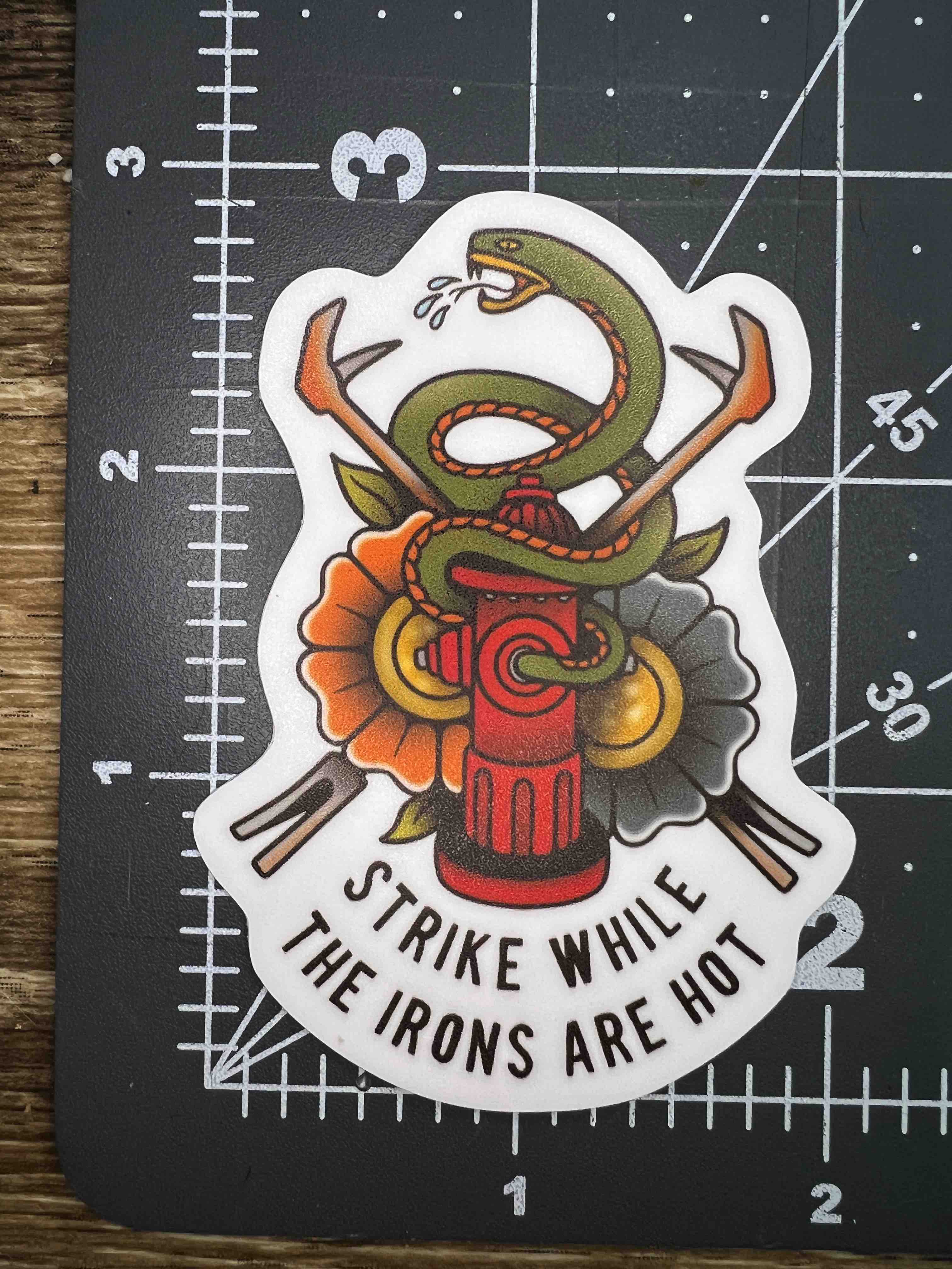 "Strike While The Iron Is Hot" Sticker